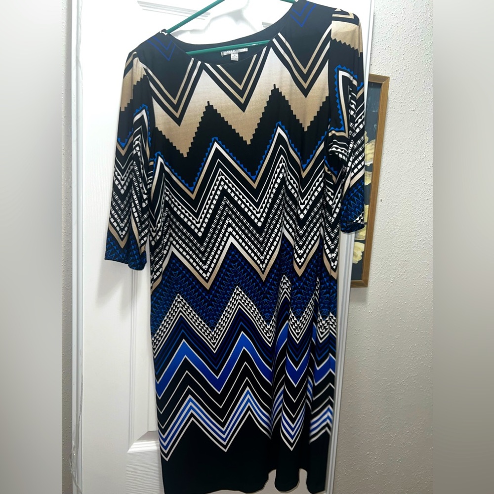Women's blue, black and tan dress.  3/4 length sleeves.
